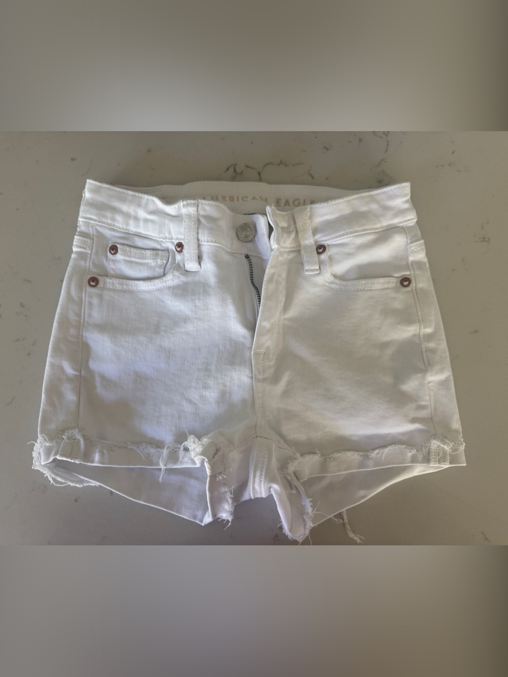 American Eagle White Distressed Denim Cutoff Shorts